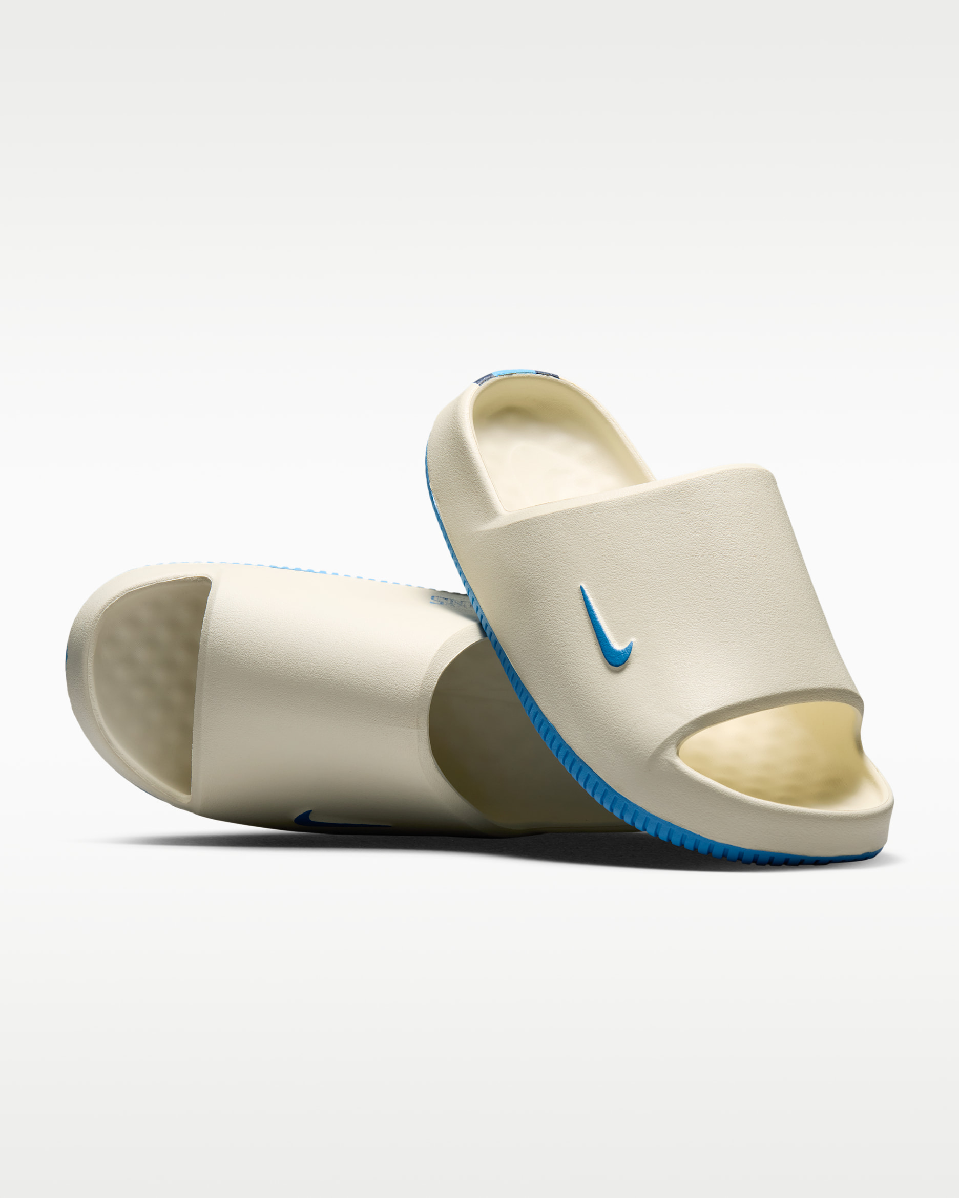 Nike Calm (Tennessee Titans) Men's NFL Slides. Nike.com